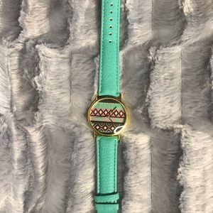 Teal green watch